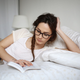 Image for article titled Bored Woman To Give Book Few More Chapters Just In Case Author Gets Better At Writing